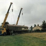 The heart-stopping moment when the frail structure of the coach is lifted by crane back onto a supporting lorry. The carriage did not have a supporting underframe at this point and, unsupported, was very fragile indeed.